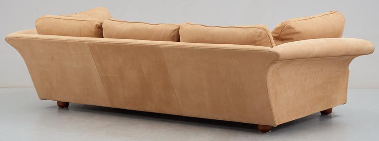 A Josef Frank 'Liljevalchs' sofa, Svenskt Tenn, reupholstered in light brown suede.