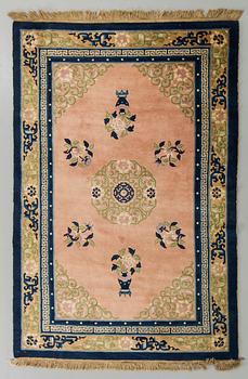 An old Chinese carpet ca 200 x 132 cm.