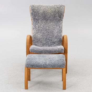 Jan Ekström, armchair with footstool "Gazelle", Conform, 21st century.