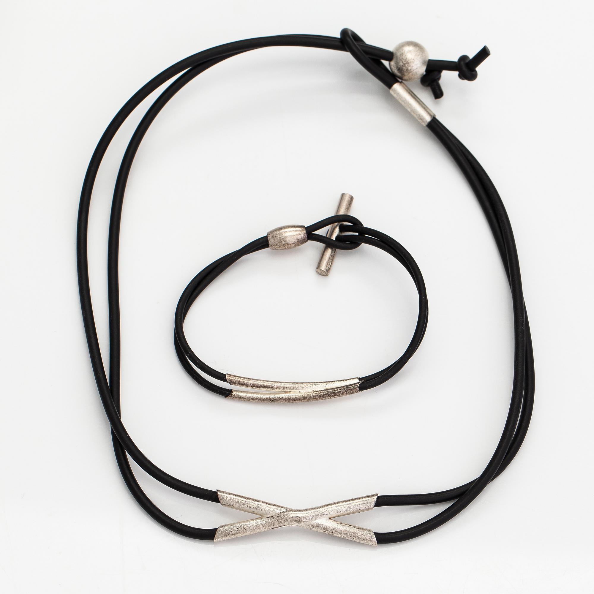 Christoph Burger, A necklace and a bracelet "Edition amour", sterling silver and rubber strap. Lapponia 2003.