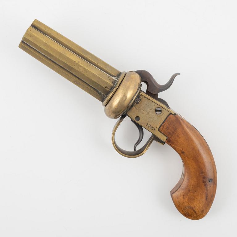 A brass percussion revolver by Johan Engholm (1820-1918).