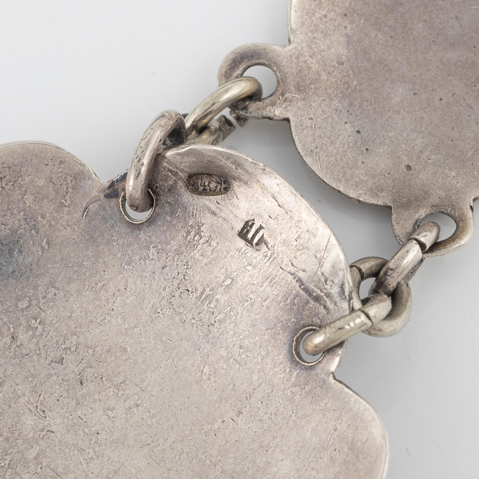 Skärp samt hänge, silver, omkring år 1900.