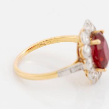 An 18K gold and platinum ring set with a faceted ruby weight ca 3.35 cts.