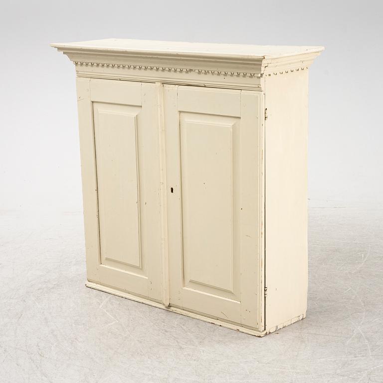 A Gustavian cabinet from around the year 1900.