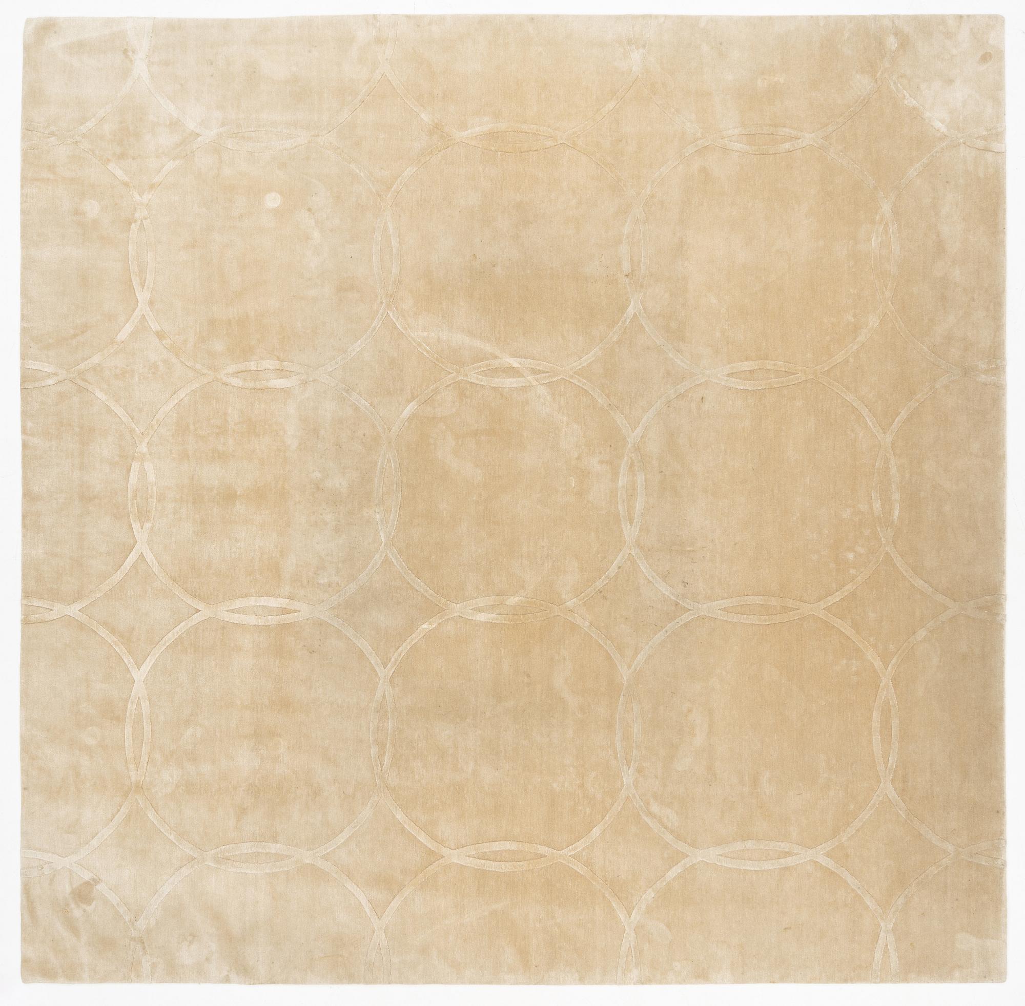 A carpet 360 x 360 cm.