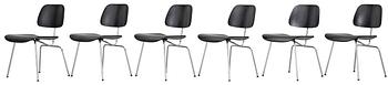 12. A set of six Charles & Ray Eames 'DCM' chairs by Vitra.