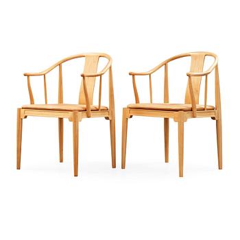 124. A pair of Hans J Wegner 'China chairs', Fritz Hansen, Denmark 1986-87.