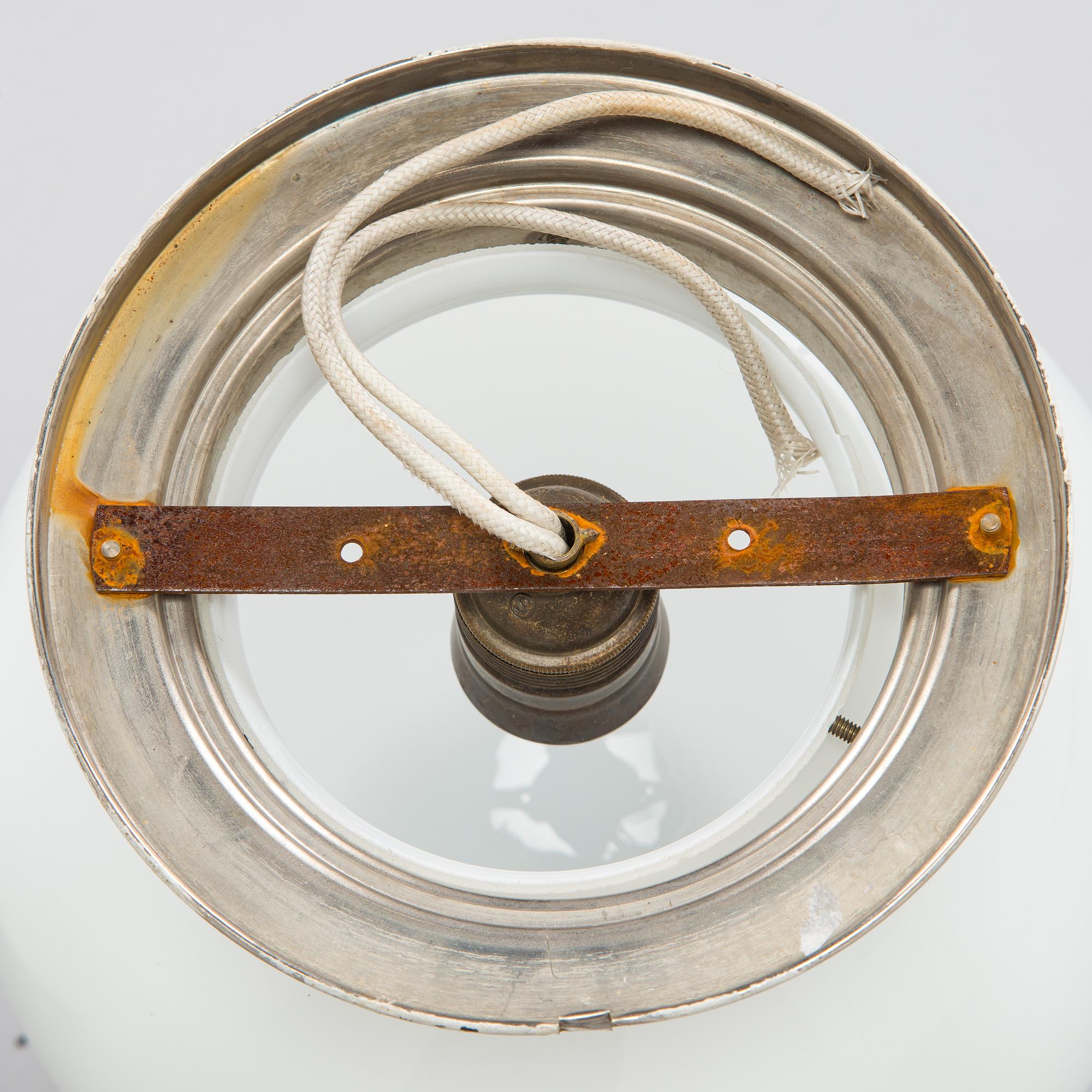 A pair of 1930s ceiling lights.