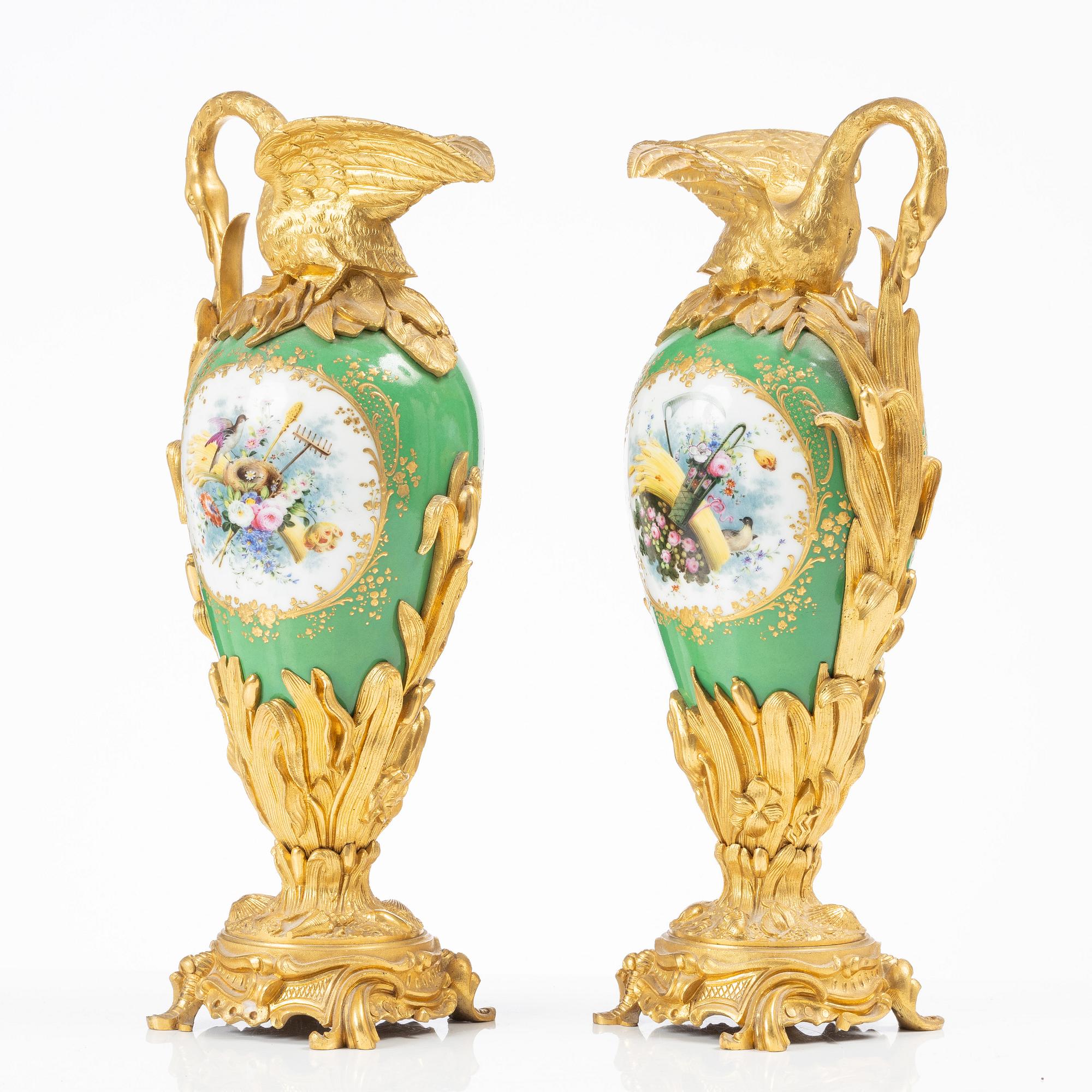 A pair of Louis XV-style gilt bronze and porcelain decorative ewers, France, later part 19th century.