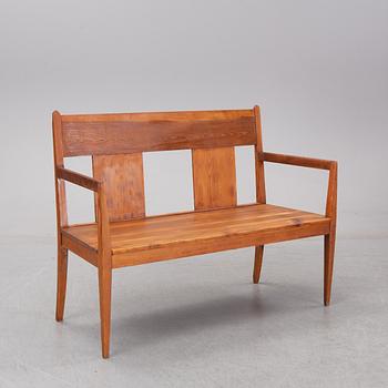 A pine sofa from Nordiska Kompaniet, before 1909.