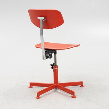 A red desk chair, 1970's.