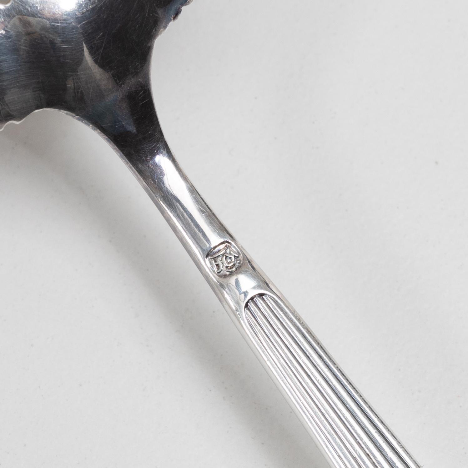 C.G. Hallberg, A Swedish silver sugar bowl with glass insert, mark of CG Hallberg, Stockholm 1896.