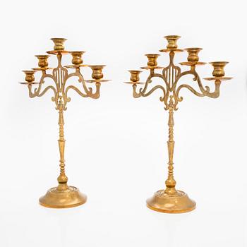 A pair of brass candelabras, early 20th century.