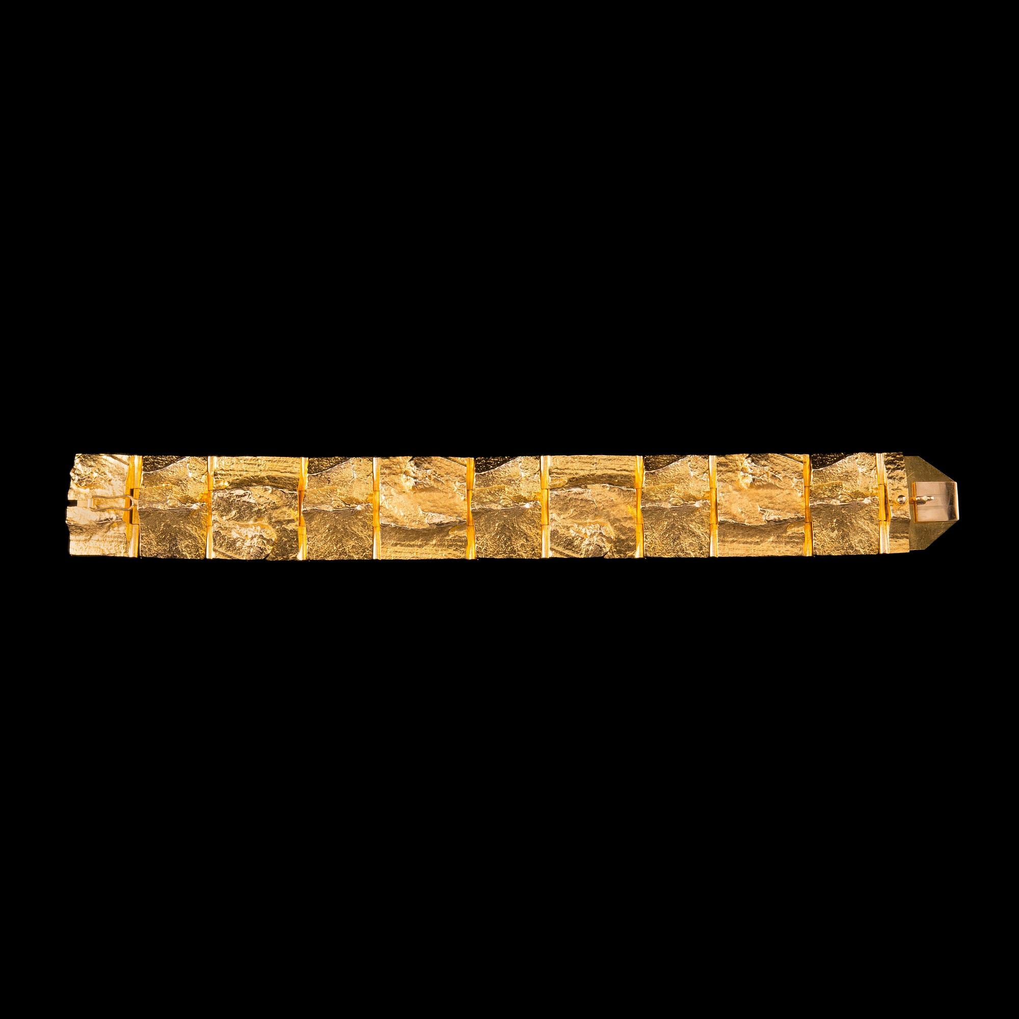 ARMBAND, guld 14K, "Golden Stream" Björn Weckström Lapponia 1971. Vikt 62 g.