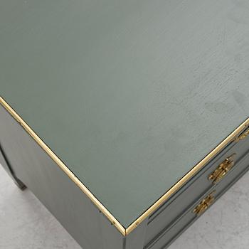 A Gustavian style chest of drawers, circa 1900.