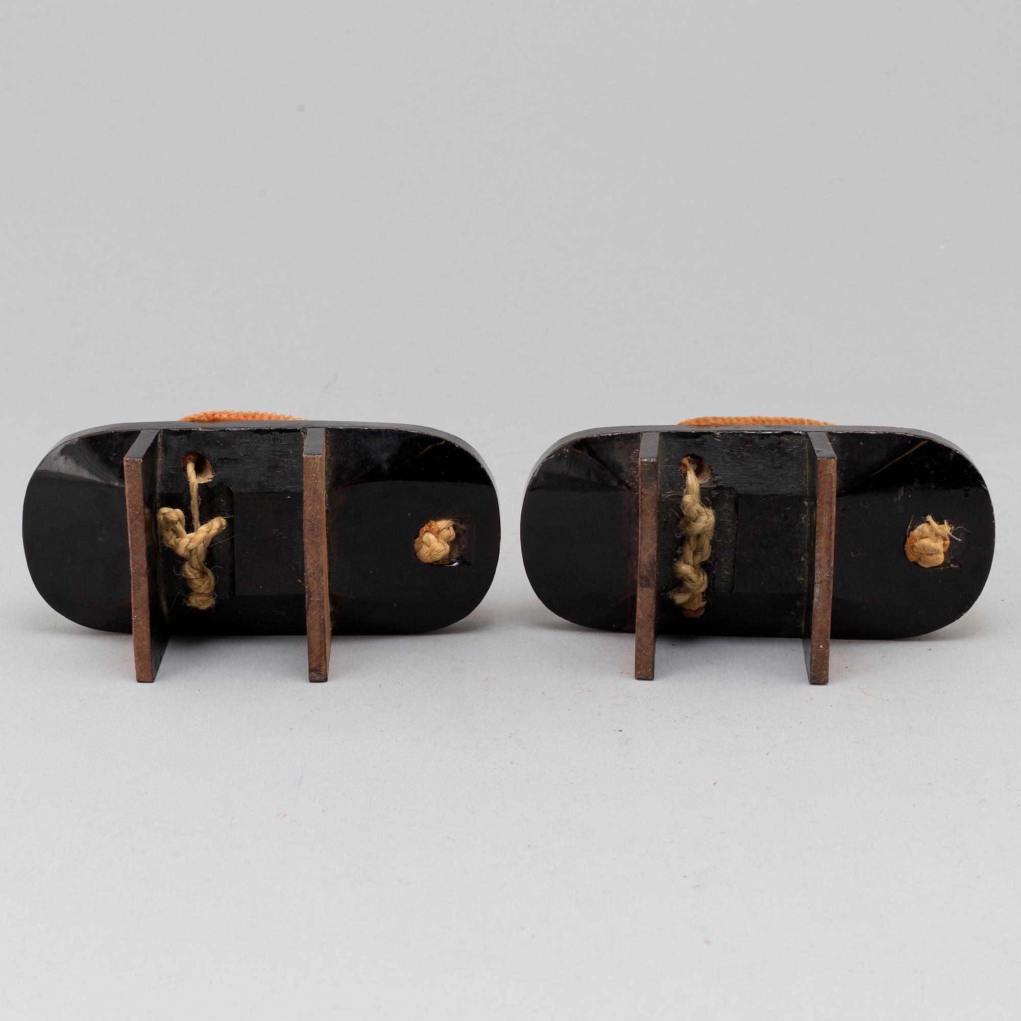 A pair of Japanese 'Geta' shows and two Chinese pouches, early 20th century.
