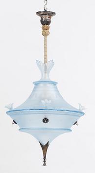 A Simon Gate light blue glass and silver plate chandelier by Orrefors, ca 1925.