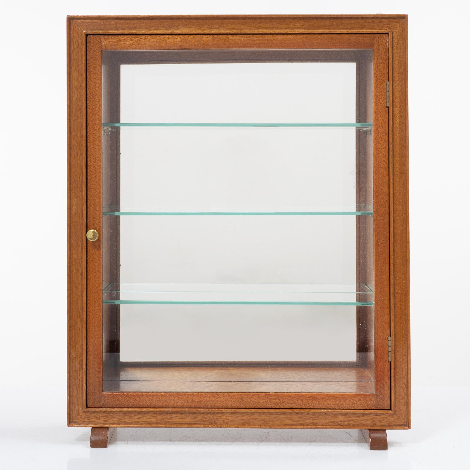 Josef Frank, a mahogany table showcase cabinet, model 2069, Svenskt Tenn, pre 1985.