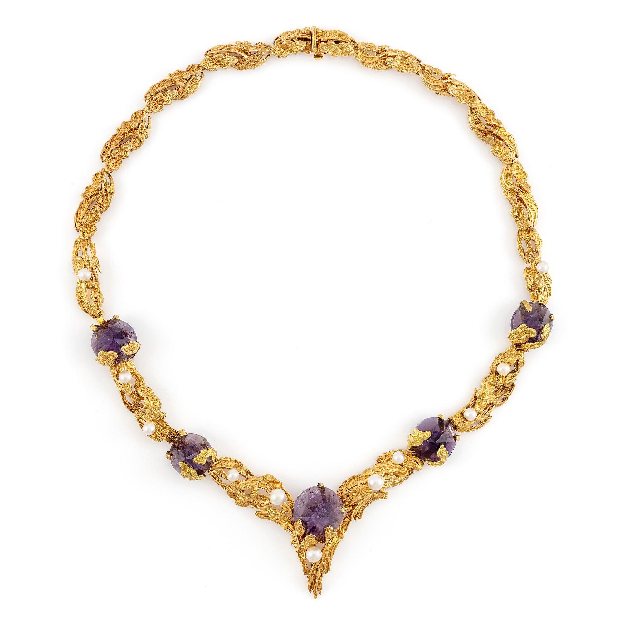 A necklace in 18K gold with faceted amethysts and cultured pearls, by Grosse.