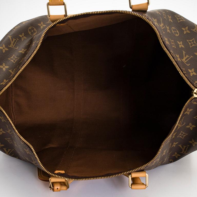 Louis Vuitton, a Monogram Canvas 'Keepall 55 Bandouliere' bag.