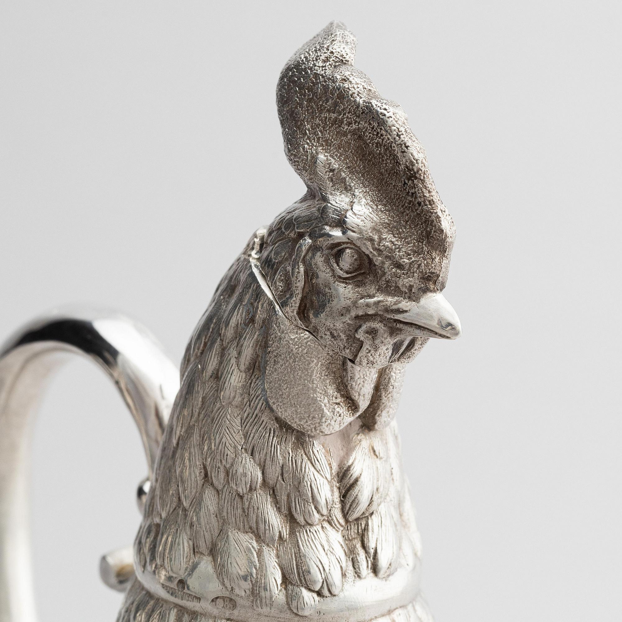 A pair of silver and cut-glass decanters, mark of Gratchev company, St. Petersburg 1908-1917.