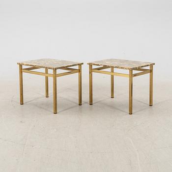 A pair of metal and stone side tables from the second half of the 20th century.
