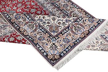 A carpet, Nain, part silk, 6 laa, c. 303 x 184 cm.