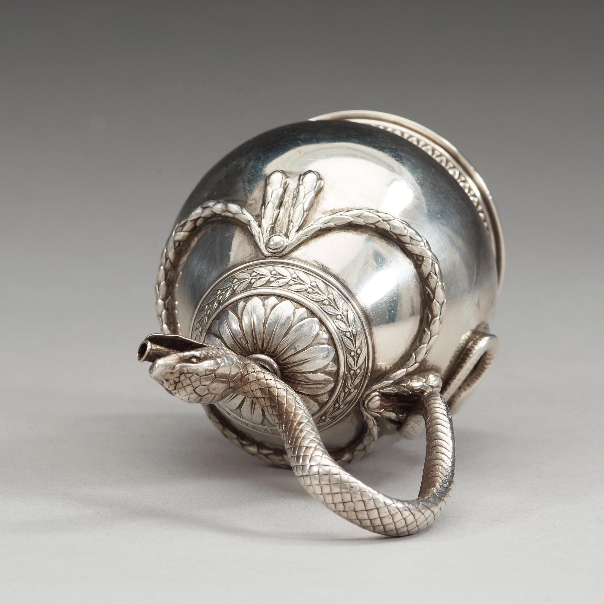 A Russian early 20th century FABERGÉ silver burner, marks of The First Silver Artel, S:t Petersburg 1908-1917.
