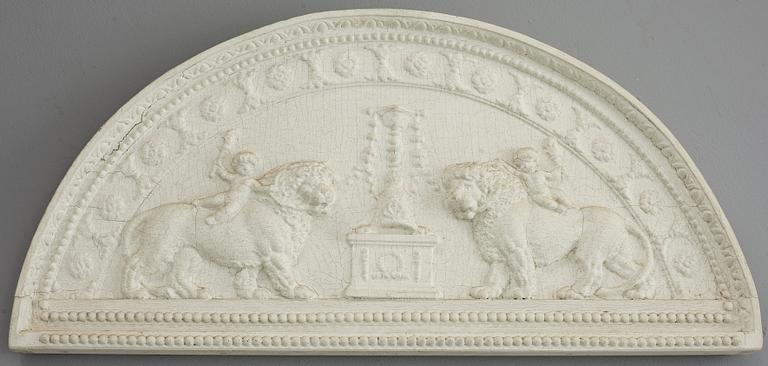 A late Gustavian carved and gesso crest, circa 1800.