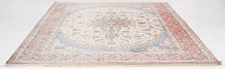An Isfahan carpet, signed, approx. 372 x 255 cm.