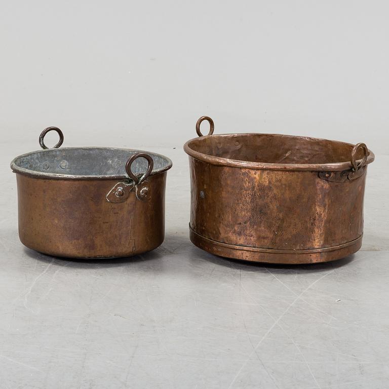 two copper pots from the 19th century.