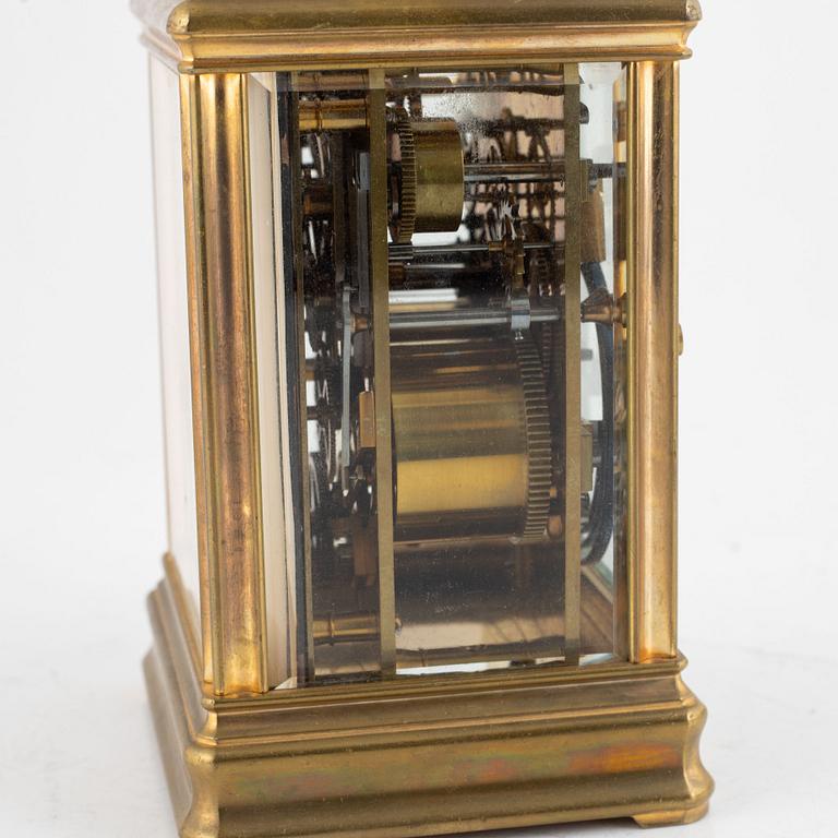 A brass carriage clock, first half of the 20th century.