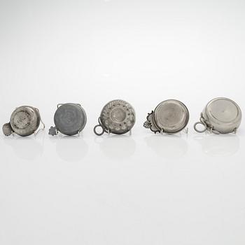 A set of fourteen tastevin cups, pewter and glass, 20th century.