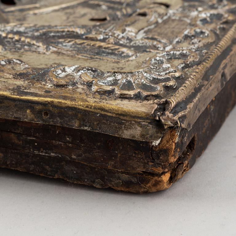 A russian icon with ochlad, rempera on panel, 19th Century.