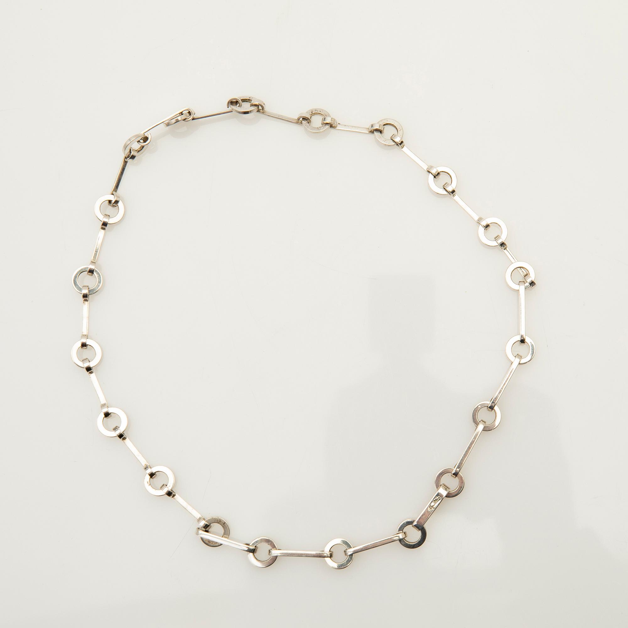Efva Attling, halsband, ring, ett par örhängen, "Ring Chain", sterling silver.
