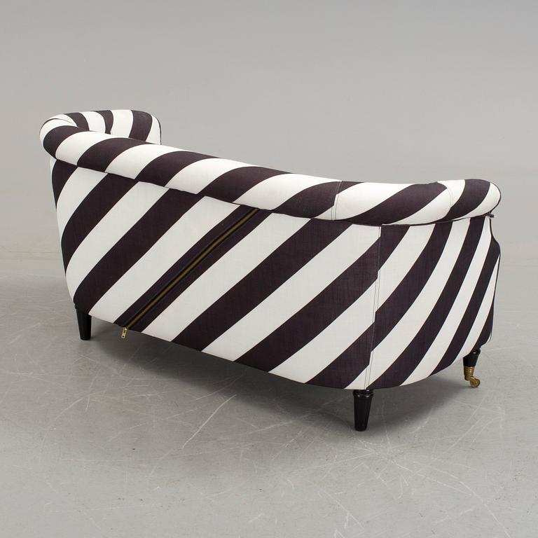 A black and white striped sofa by Rosenhof Art Factory, 21st century.