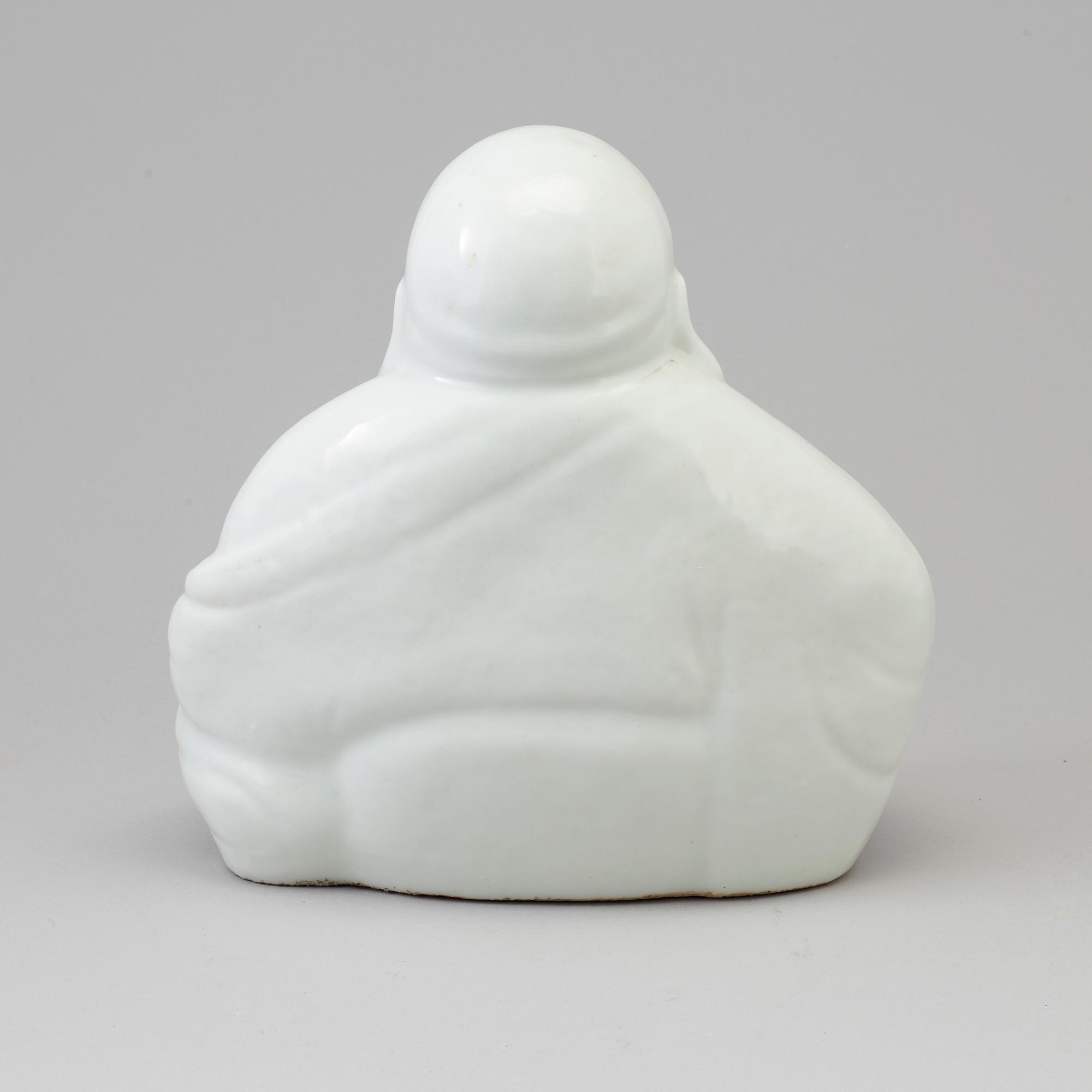 A Chinese porcelain Buddhai, 20th century.