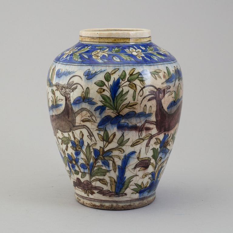 A POTTERY URN, probably late Qajar dynasty, Persia/Iran, height ca 27,5 cm.