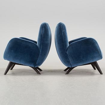 A pair of 1950´s Melchiorre Bega armchairs probably from Campo graffi.