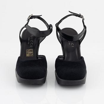 Gucci, a pair of wedge heel shoes, Italian size 36.