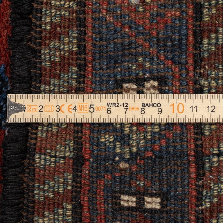 A runner carpet, antique Kurdish possibly, c. 280 x 112 cm.