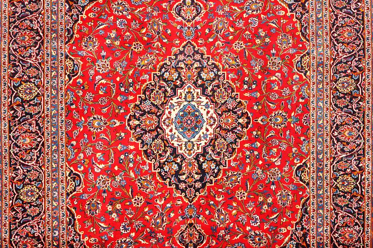A Keshan carpet, c. 380 x 255 cm.