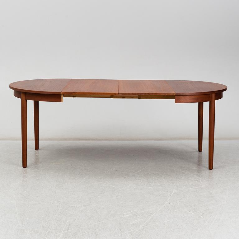 a teak dining table from the second half of the 20th century.