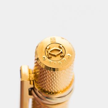 Cartier, must de Cartier, a "Trinity" ballpoint pen.