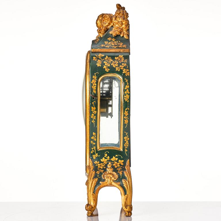 A Swedish rococo mantel clock by N Berg.