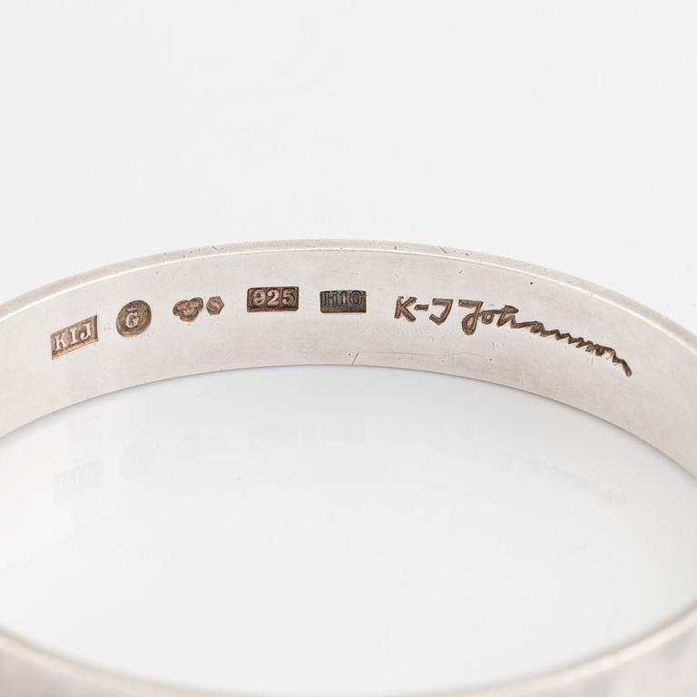 Karl-Ingemar Johansson a silver bracelet.