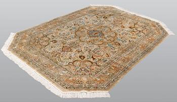 A rug, oriental silk, ca silk, ca 245 x 175 cm.