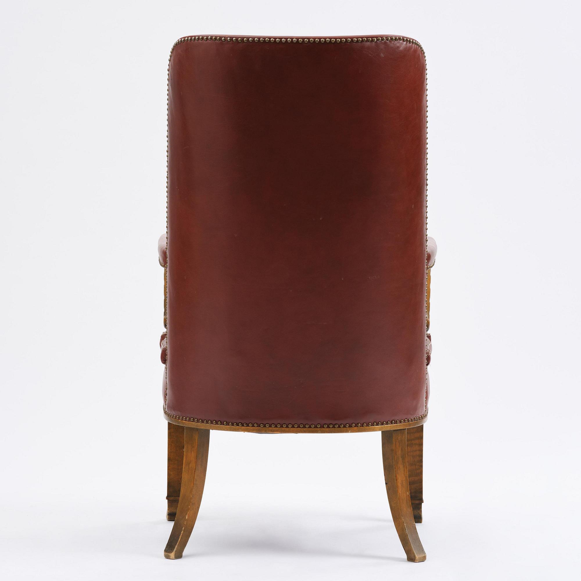 Axel Einar Hjorth, a "Caesar" stained birch and leather armchair, Nordiska Kompaniet, Sweden, 1929.