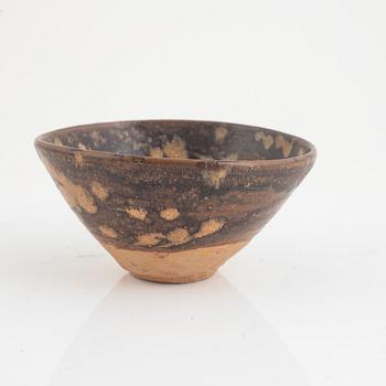 A tenmoku glazed bowl, Song dynasty (960-1279).