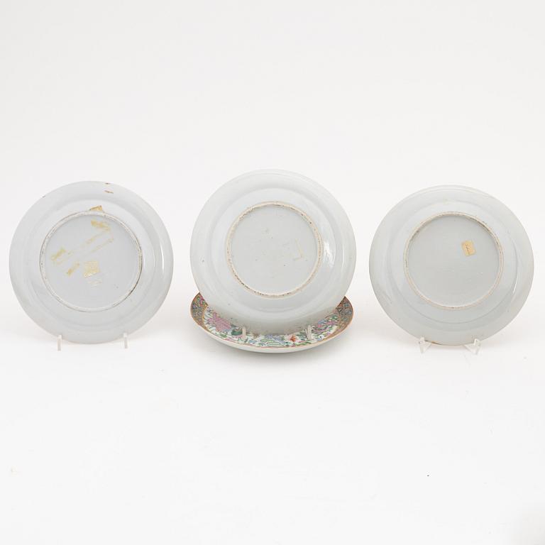 A group of four Canton plates (2+1+1) and a cup with saucer, 19th century.